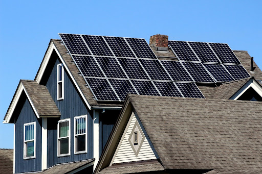 A house with rooftop solar panel systems