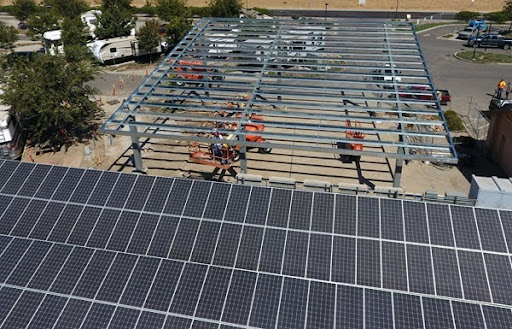 Aerial view of a solar panel installation showcasing ground-mount systems.