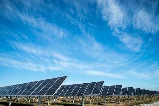 Solar farm under a blue sky