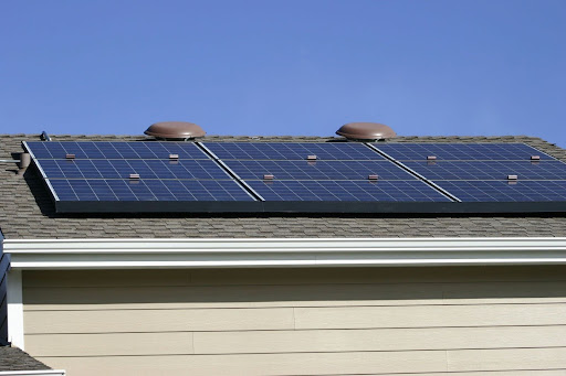 Solar panels on a grey rooftop