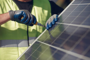 Technician working on a solar panel installation