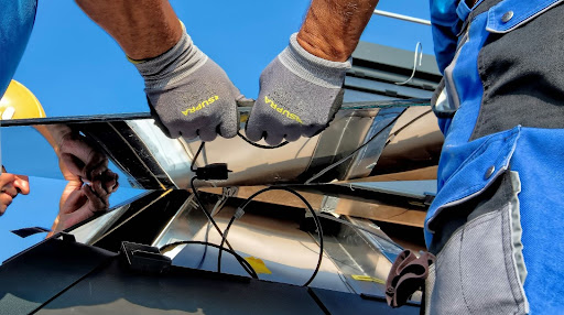 Technicians installing a solar racking system.